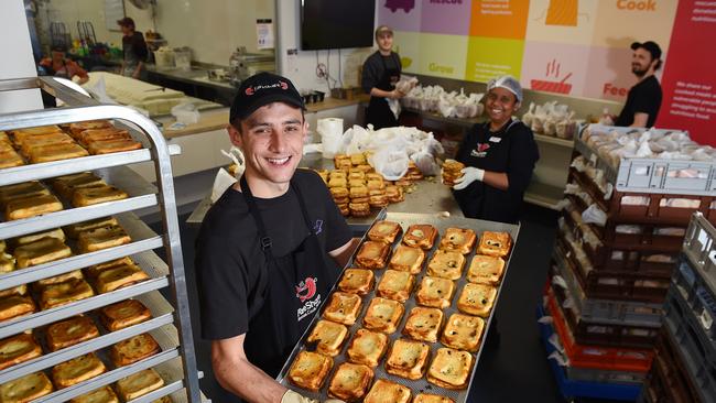 Brad Milnes, James Walker, Elizabeth Desire and Chris Seeley packing quiches. Picture: Josie Hayden