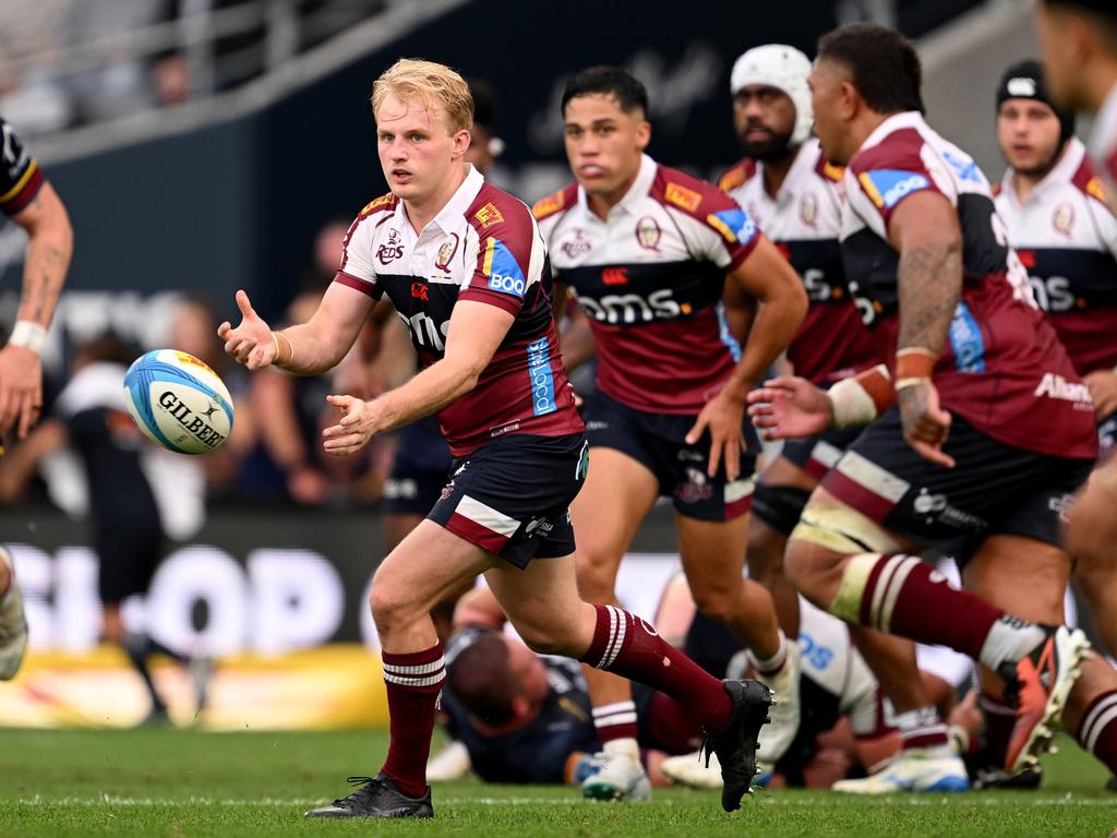 Reds playmaker Tom Lynagh passes during the drought-breaking win against the Highlanders. Picture: Getty Images