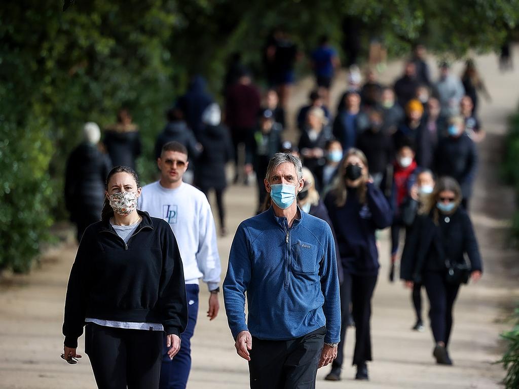 People had to wear a mask wherever they went. Picture: Ian Currie