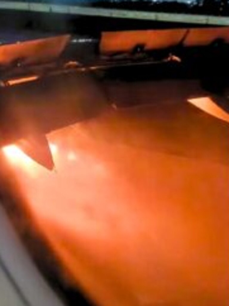 The engine burst into flames with 179 people on board. Picture: ViralPress.