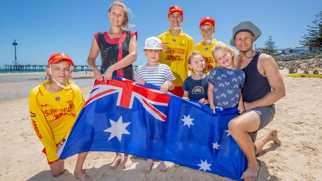 Lifesavers Cameron Mollison, Jacob Newrick and Luca Floreani on patrol at from the Brighton SLSC, with Bridget Ivanovic, Hazel Robberts, Heidi Robberts, Mila Ivanovic, Seth Robberts on Australia Day. Pictures: Ben Clark