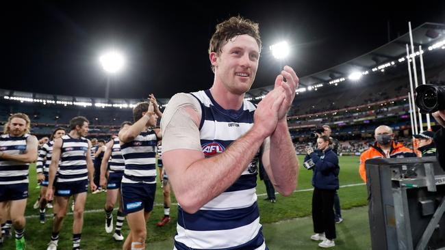 Jed Bews is applauded from the field after Geelong’s preliminary final win.