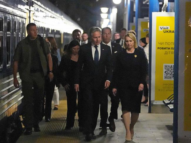 U.S. Secretary of State Antony Blinken (C) and US Ambassador to Ukraine Bridget Brink (R) walk on the quay as he prepares to depart the train station in Kyiv. Picture: AFP