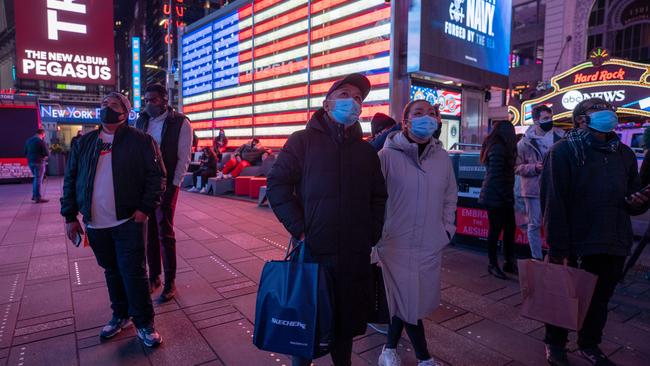 People gather in Times Square as they await election results on November 3 in New York City. Picture: AFP