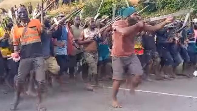 Grainy footage of tribal fighters, many armed with guns and machetes, reveals the level of violence erupting in Enga Province in PNG’s Highlands. Picture: Facebook