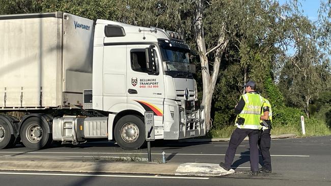 Police stop traffic n the Bruce Highway north of Gympie after multiple people were injured in a two-car crash on Wednesday afternoon.