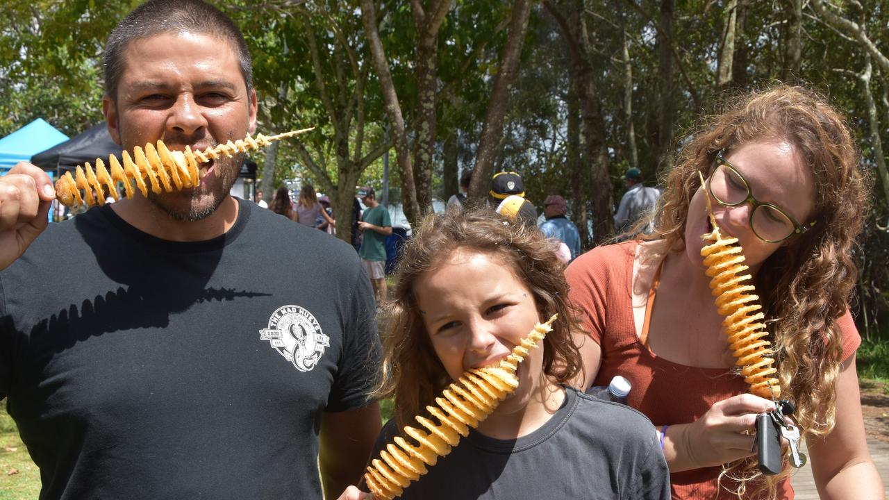 Floyd Robinson, Eli 10 and Megan Rose enjoy a tasty treat.