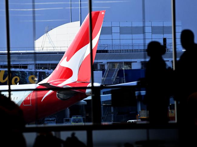 SYDNEY, AUSTRALIA - NewsWire Photos JULY 29, 2022: General scenes of a Qantas plane at the arrival gate at SydneyÃs International AirportPicture: NCA NewsWire / Jeremy Piper