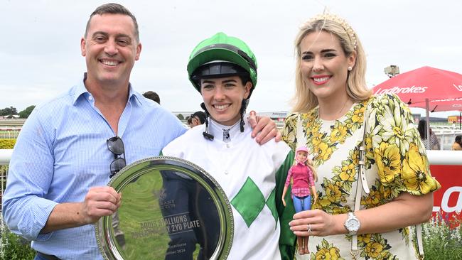 Trainer Tony Gollan, jockey Angela Jones and Jessica Acton, the daughter of the late Alan Acton, after Hi Barbie's win at Doomben. Picture: Grant Peters / Trackside Photography