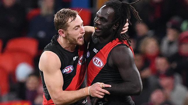 Devon Smith and Anthony McDonald-Tipungwuti celebrate a goal.