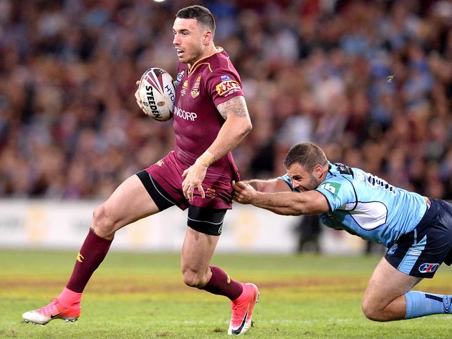 Darius Boyd attempts to break away from the defence during game one.