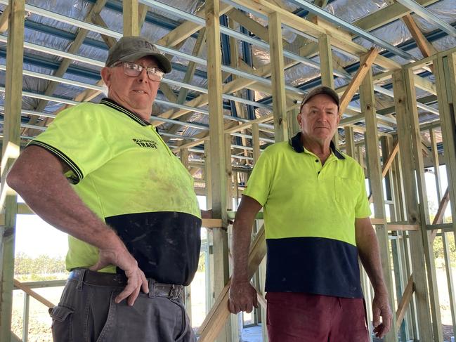 Wayne and Michael Stolberg, Gympie subcontractors, at a house under construction.