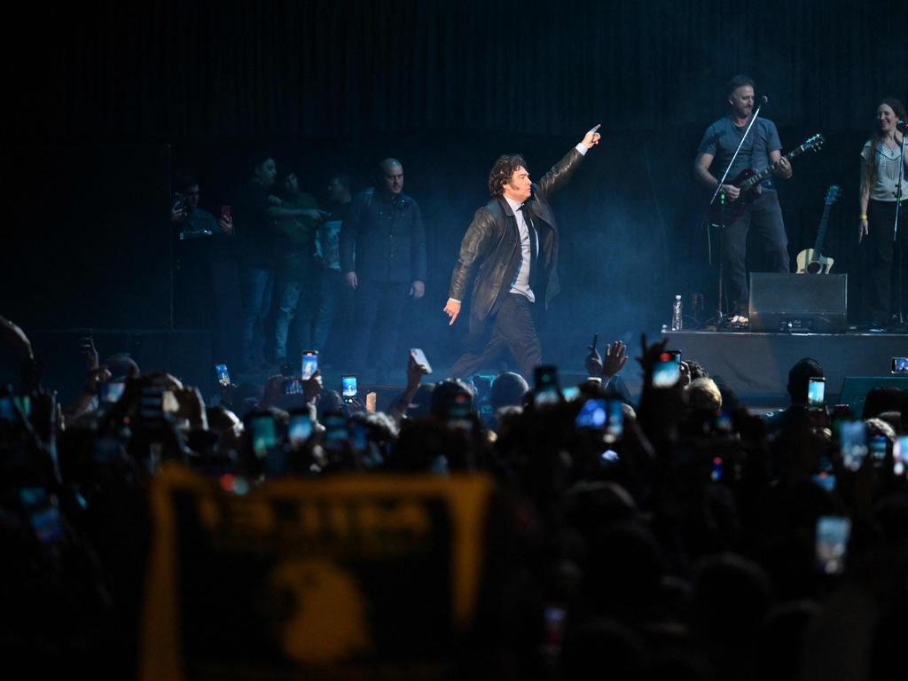 Argentine President Javier Milei (C) dances during the presentation of his new book “Capitalism, Socialism, and the Neoclassical Trap” at the Luna Park stadium in Buenos Aires on May 22, 2024. Picture: AFP