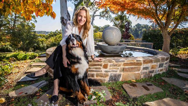 Kay Burton at home with her dog Bo, a sociable Bernese mountain dog. Picture: Tom Huntley