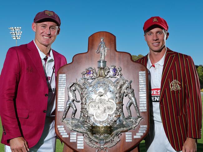 ADELAIDE, AUSTRALIA - MARCH 25: Marnus Labuschagne of the Queensland Bulls and Nathan McSweeney of South Australia  with the Sheffield Shield during a media opportunity ahead of this week's Sheffield Shield Final between South Australia and Queensland, at Karen Rolton Oval, on March 25, 2025, in Adelaide, Australia. (Photo by Sarah Reed/Getty Images)