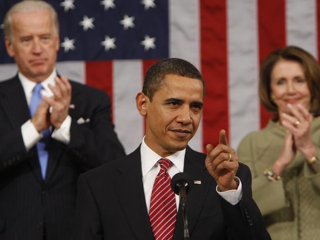 Joe Biden and Nancy Pelosi applaud then President Barack Obama in 2009. Picture: AFP