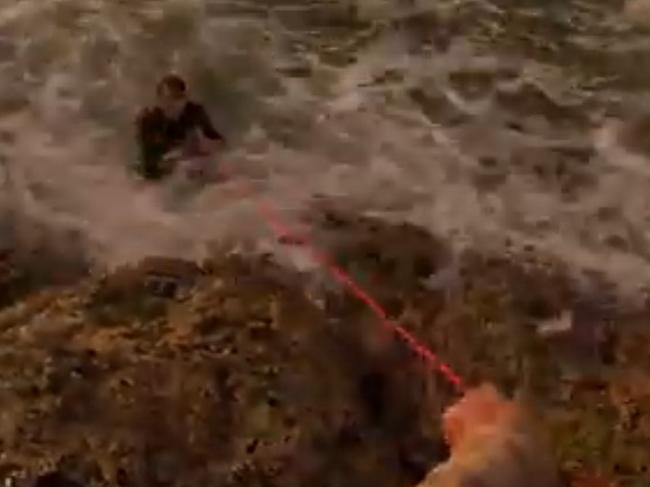 Extraordinary and terrifying footage a teenâs rescue from the ocean after slipping on rocks while fishing at Double Island Point in April 2024 has emerged, with his family saying they hoped it would save a life. Pictures: Aiden Whiteman, Whiteey's FIshing.