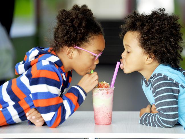 Go West -Auburn . Marika Kahle and her two children, Jamila 6, and Caspian 2 at the Auburn Juice Centre. Photo Jeremy Piper