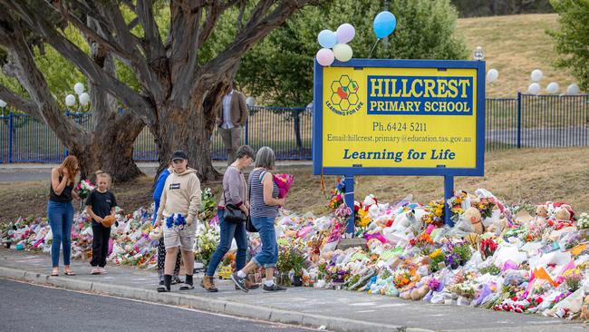 Mourners pay tribute to the children who died after gust of wind swept away a jumping castle at Hillcrest Primary School Devonport Tasmania. Picture: Jason Edwards