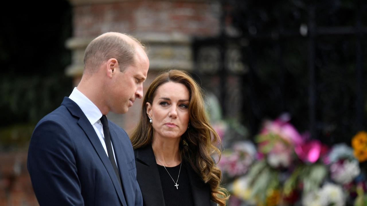 Prince William, Prince of Wales and Catherine, Princess of Wales, view floral tributes placed outside the Sandringham Estate. (Photo by Toby Melville - WPA Pool/Getty Images)