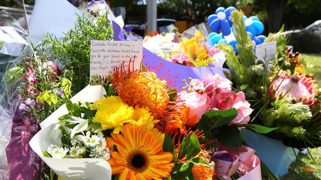 Dozens of bouquets of flowers have been placed outside of the local police station. Picture: David Clark / NCA NewsWire