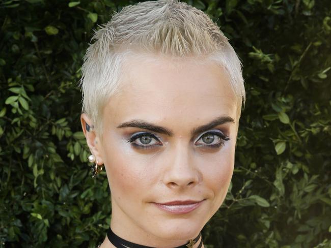 British model and actress Cara Delevingne made bushy eyebrows fashionable.  Picture:  AFP