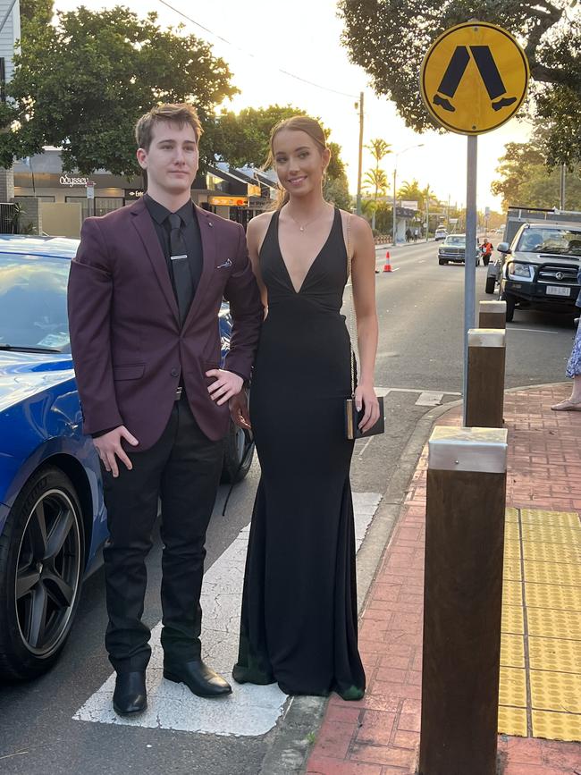 Liam Horton and Sophia Thompson arrived at the formal in a blue Mustang.