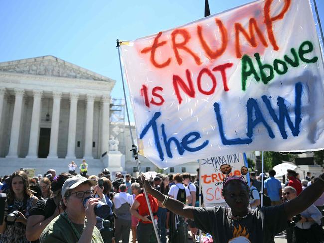 People hold anti Trump signs in front of the US Supreme Court on July 1, 2024, in Washington, DC. Picture: Drew Angerer/AFP