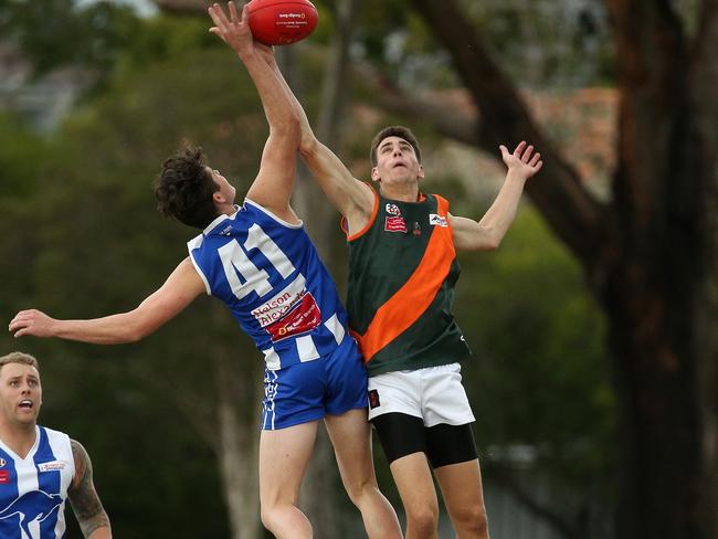 EDFL footy: Oak Park v Keilor Park: Taylor Hotchkin (left) of Oak Park contests ruck against Samuel Pontin of Keilor ParkSaturday, April 24, 2021, in Oak Park, Victoria, Australia. Picture: Hamish Blair