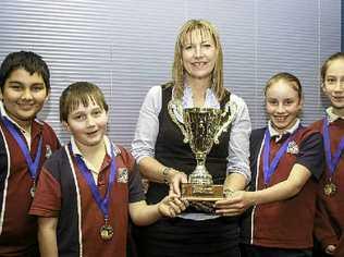 Adam Nisha, Daniel Tynan, Georgia Browning and Georga Tumata with librarian Lea-anne Weier after last weeks Readers Challenge.