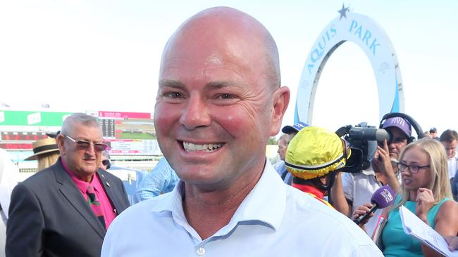 Gold Coast Turf Club race meeting, featuring two major lead in races to the Magic Millions.Photo of race 7. Photo of winner number 9 SNOW VALLEY. Jockey is Robbie Fradd, trainer is Matthew Dunn (pictured).Photo by Richard Gosling