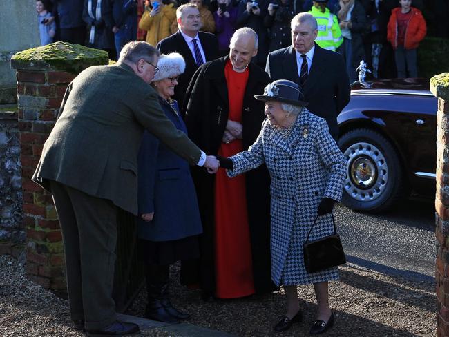 The Queen seemed happy to leave the Megxit mess behind for a short time while she went to church. Picture: AFP