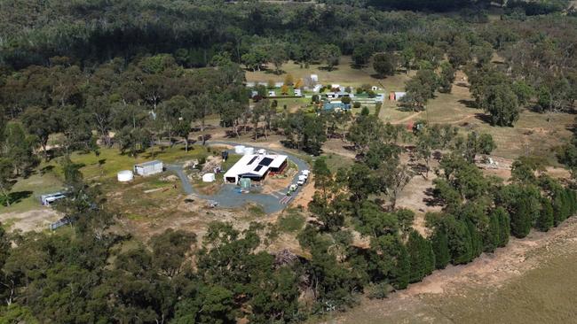 Police and emergency crews have swarmed the house on Emu Ln in Coonabarabran, after two boys were found dead during a welfare check on Monday. Picture: NewsWire