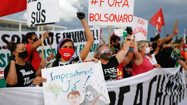 Demonstrators hold a protest against Brazil's President Jair Bolsonaro's measures to combat the pandemic. Picture: AFP