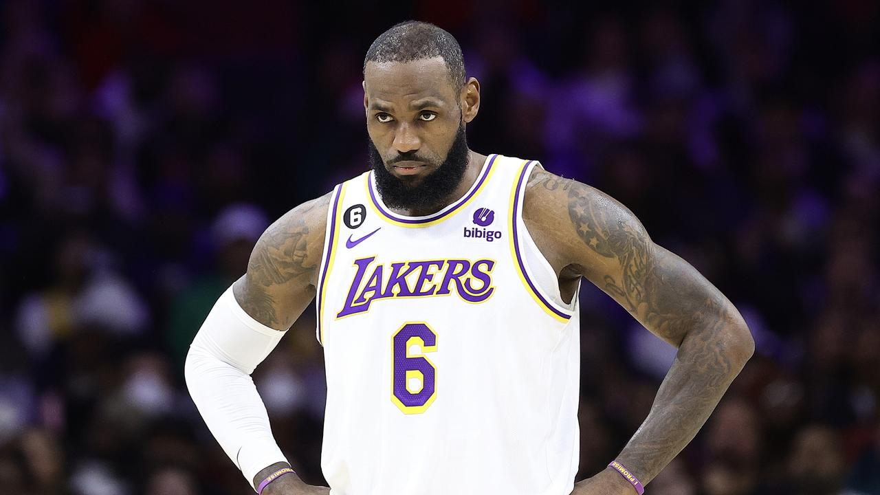 PHILADELPHIA, PENNSYLVANIA - DECEMBER 09: LeBron James #6 of the Los Angeles Lakers looks on during the second quarter against the Philadelphia 76ers at Wells Fargo Center on December 09, 2022 in Philadelphia, Pennsylvania. NOTE TO USER: User expressly acknowledges and agrees that, by downloading and or using this photograph, User is consenting to the terms and conditions of the Getty Images License Agreement. (Photo by Tim Nwachukwu/Getty Images)