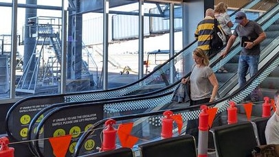 A picture of the escalators in action. They’re located in a brand new section of the airport.