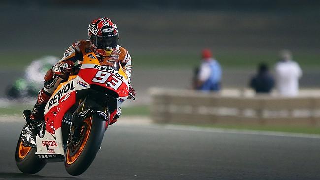 Repsol Honda MotoGP rider Marc Marquez of Spain speeds at the Losail International Circuit during a free practice in Doha, Qatar on Thursday.