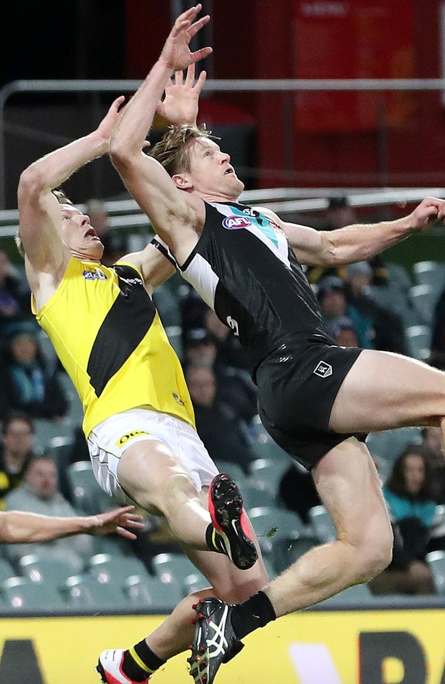 Riewoldt and Jonas compete during the match. Picture: Sarah Reed