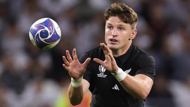 LYON, FRANCE - OCTOBER 05:  Beauden Barrett of the New Zealand All Blacks catches the ball during the Rugby World Cup France 2023 Pool A match between New Zealand and Uruguay at Parc Olympique on October 05, 2023 in Lyon, France. (Photo by David Rogers/Getty Images)