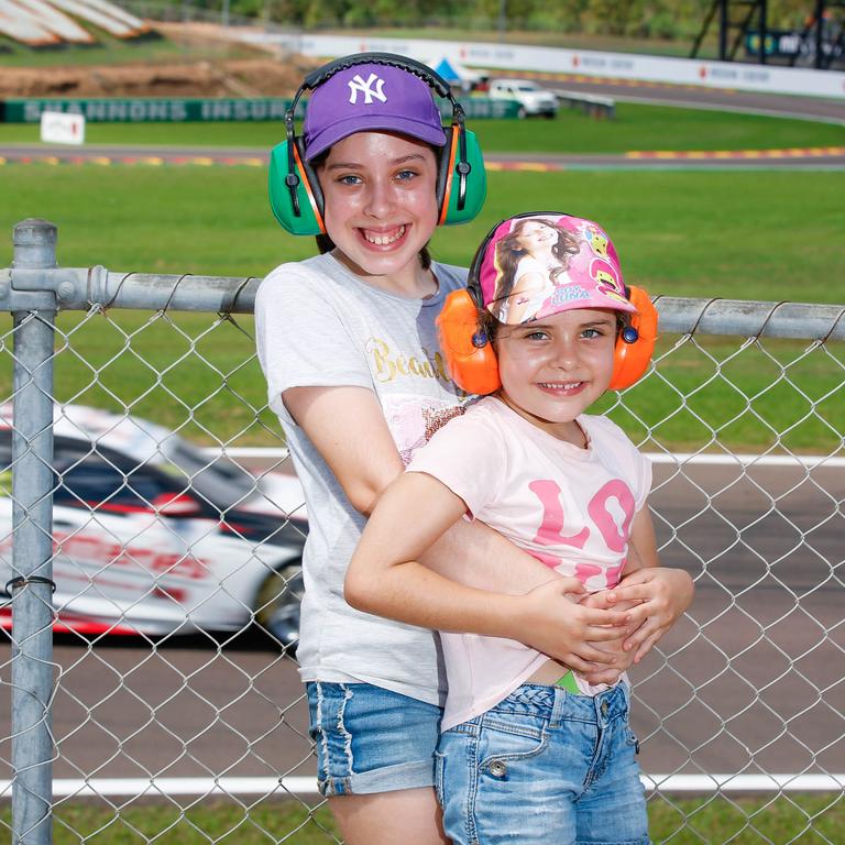 Naiara Castineira, 12, with her sister Kayla Castineira, 5, at the Darwin Supercars at Hidden Valley. Picture: GLENN CAMPBELL