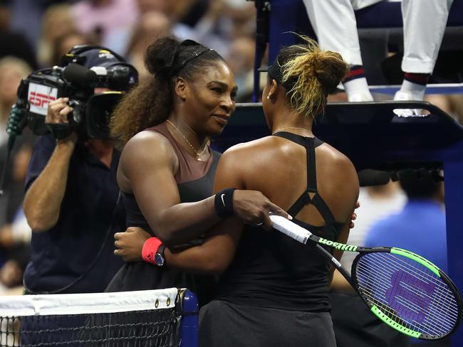 Naomi Osaka and Serena Williams embrace after the dramatic US Open women’s final. Picture: Julian Finney/Getty/AFP