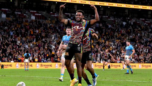 Ezra Mam celebrates after scoring a try. (Photo by Bradley Kanaris/Getty Images)