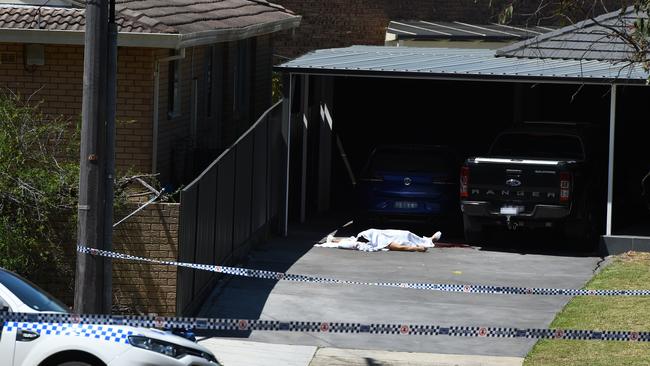 Assaad’s body lies in the driveway where he was gunned down.