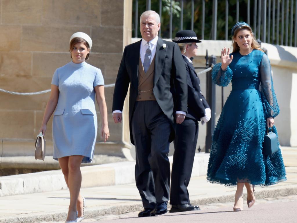 Princess Eugenie, Prince Andrew and Princess Beatrice arrive at Prince Harry and Meghan Markle’s 2018 wedding. Picture: Getty Images