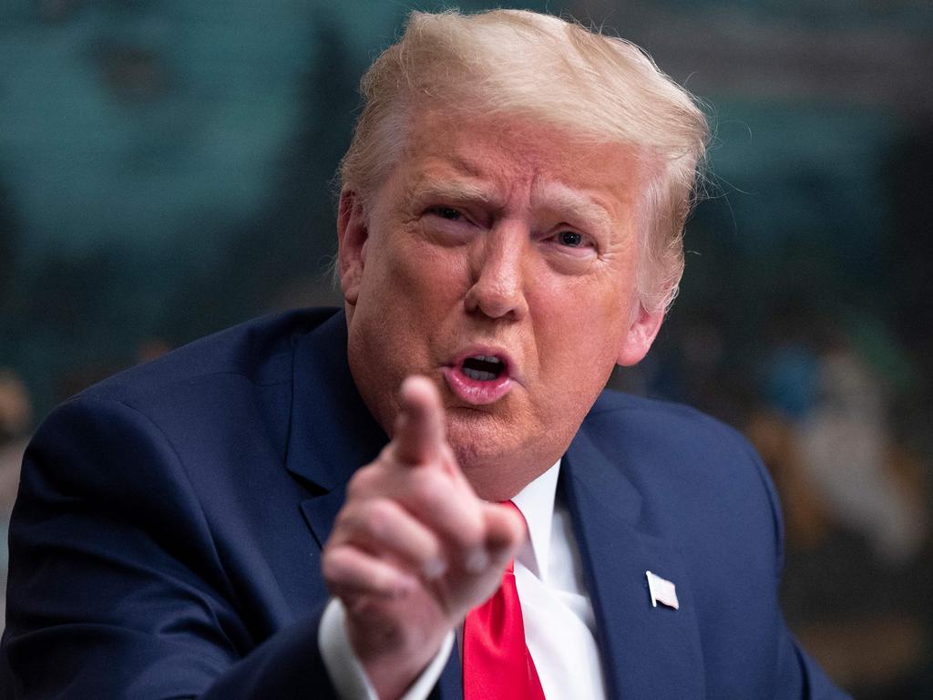 Donald Trump speaks to reporters after participating in a Thanksgiving teleconference with members of the United States Military, at the White House.