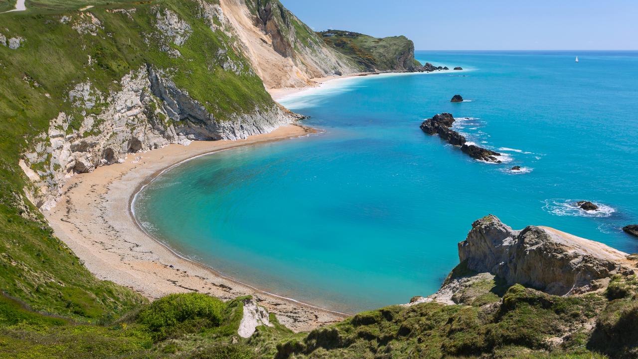 The man fell to his death after climbing up the Stair Hole at Lulworth Cove in Dorset.