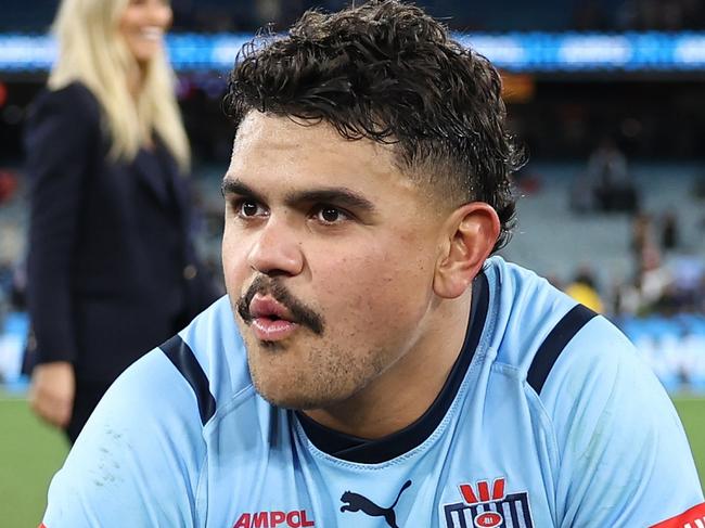 MELBOURNE, AUSTRALIA - JUNE 26:  Latrell Mitchell of the Blues reacts after winning game two of the men's State of Origin series between New South Wales Blues and Queensland Maroons at the Melbourne Cricket Ground on June 26, 2024 in Melbourne, Australia. (Photo by Cameron Spencer/Getty Images)