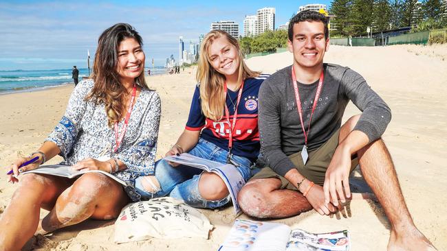 International students Yu Okano, 32, from Japan, Charlotte Higuet, 19, from Belgium, and Lucas Santos, 18, from Brazil, study on the Gold Coast. Picture: Nigel Hallett