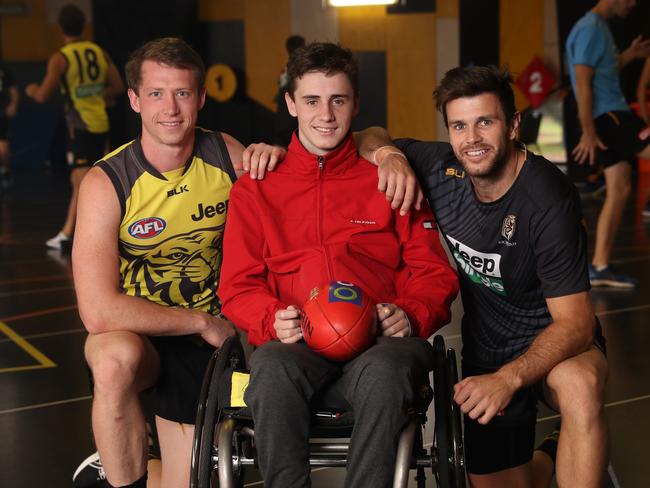 Will Murray with Richmond players Dylan Grimes and Trent Cotchin. Picture: Alex Coppel