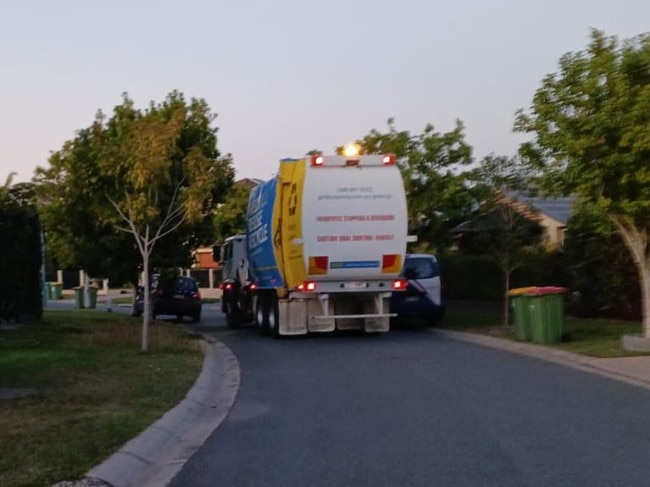 A council rubbish truck which residents reported struggled to get down an Oxenford street. Picture: Robbie Wright/Facebook.